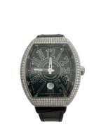 Luxury frank Muller  watch with black face and diamond-studded case on a white background