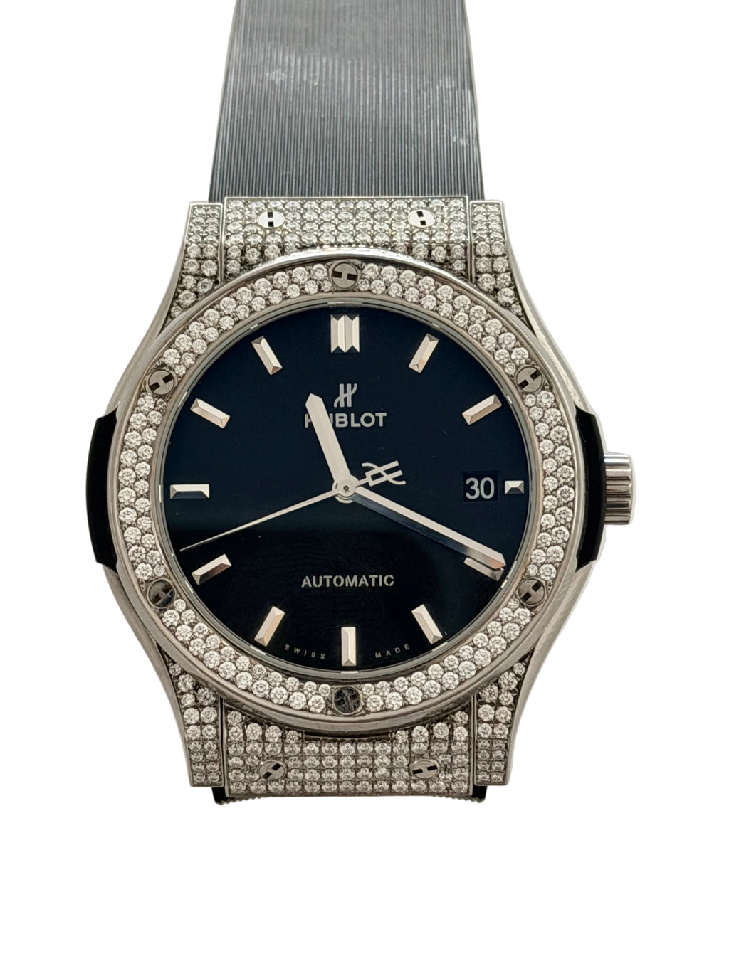 Luxury watch with diamond-studded case on a light background